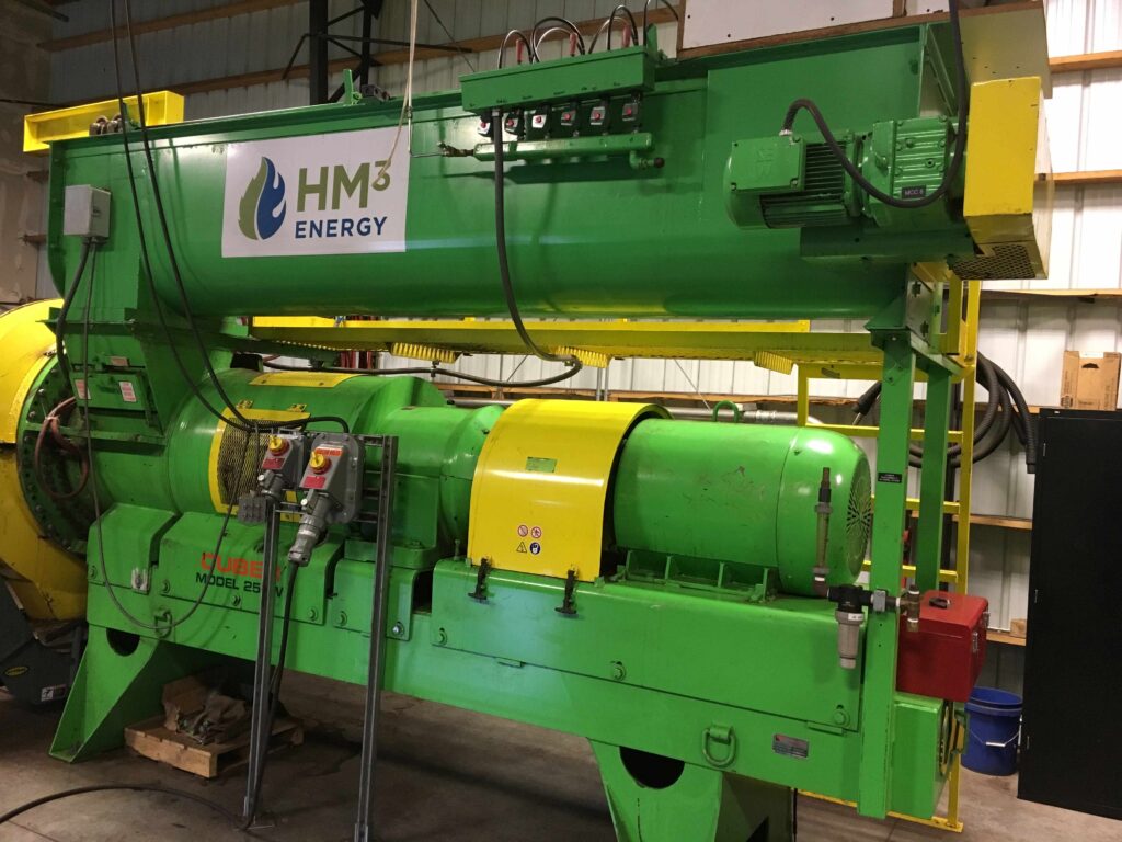 A densifier is used to briquette the feedstock